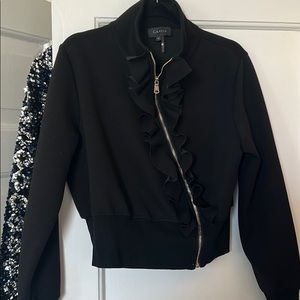 High neck ruffle zip